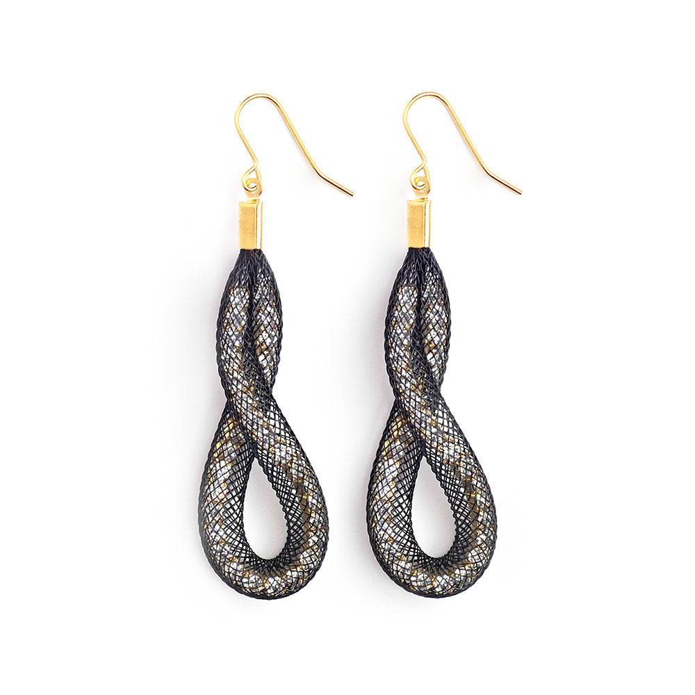The Loop & Twist earrings are  grand in gesture and uniquely shaped.
